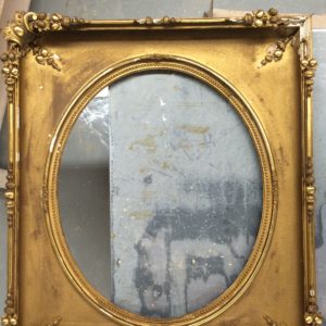 Repairing and conserving damaged 19th Century American oval opening frame replace losses throughout frame